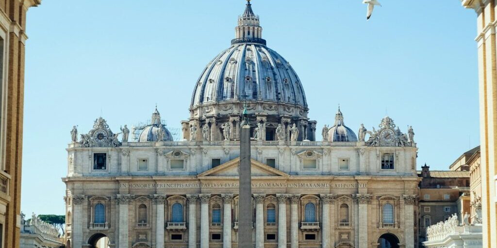 St Peter's Basilica with its large dome and an obelisk in Vatican City